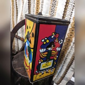 Romero Britto lithographed Creme de Grand Marnier tin signed by the artist